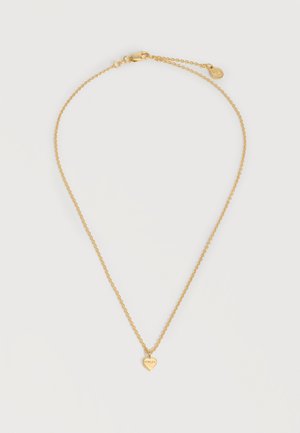 Λεπτή χρυσή αλυσίδα με μικρό μενταγιόν σε σχήμα καρδιάς με χαραγμένη τη λέξη «STOLEN» σε λευκό φόντο.