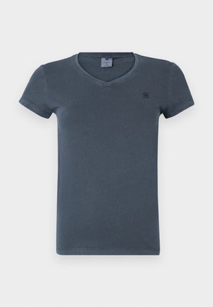 Dark blue cotton t-shirt with short sleeves, V-neck, and a small logo in the upper left. Smooth texture and basic design.