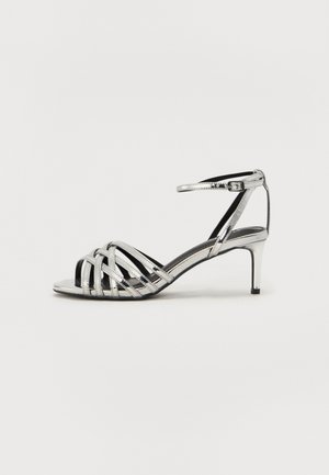 ANALIA - Ankle cuff sandals - silver coloured