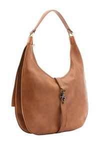 Borsa a spalla in pelle marrone con una forma morbida, dotata di chiusura magnetica e una superficie liscia. Accentuata da un dettaglio in metallo.