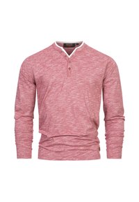Crvena dugorukavna henley majica od teksturirane pamučne tkanine, s bijelim kontrastnim ovratnikom i plaketom s tri gumba.