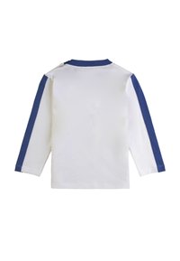 Maglietta a maniche lunghe in cotone bianco con strisce laterali blu, colletto a giro e orlo dritto. Tessuto morbido, design informale.