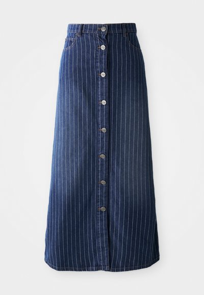Tume denim maxi seelik, millel on vertikaalsed valged triibud, eest nupuvajutus ja veidi laienev alumine äär. Omab viit nuppu ja kontrastset õmblust.