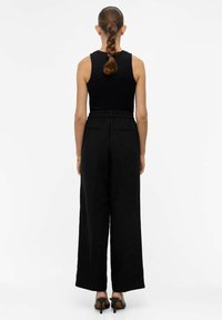 Object Pantaloni - black