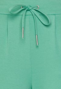 ONLY Petite ONLPOPTRASH EASY - Calças - creme de menthe
