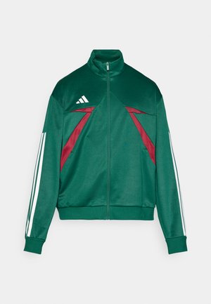 Zaļš zip-up džemperis ar augstu apkakli, bordo akcenti, baltas svītras uz piedurknēm, izgatavots no gludas auduma, ar sportisku dizainu.