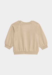 Felpa beige con scollo rotondo, maniche raglan, orlo inferiore elasticizzato e bottoni a pressione sulla spalla per una facile vestizione.