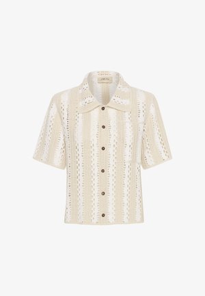 Strikket kortærmet skjorte i creme med åbne blonder, vandrette striber, spids krave og brune knapper. Lille brystlomme inkluderet.