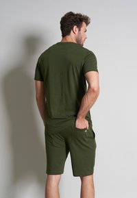 TOM TAILOR Bas de pyjama - grün-dunkel-uni