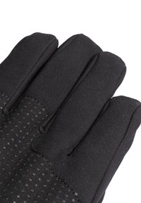 Zwarte handschoenen met een getextureerde, gevlekte palm en gladde vingers. Ontworpen voor grip en comfort, met een aansluitende stijl en op maat gemaakte naden.