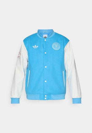 Blue varsity jacket with white sleeves, features round collar, button front, logo on chest and sleeve, and ribbed cuffs and hem.