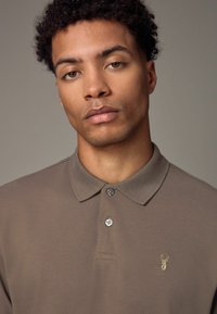 Next Polo - truffle