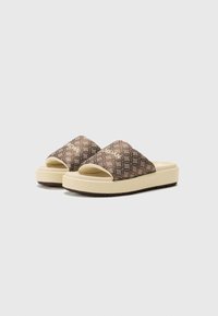 Brown patterned slide sandals with a thick cream sole and an open toe design. Features a textured material on the upper and patterned footbed.