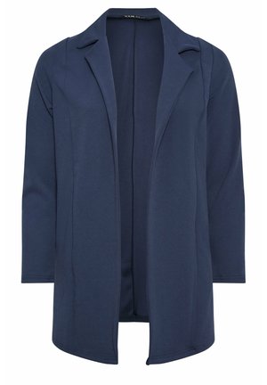Blazer femenino azul marino hecho de material suave, con un corte relajado, solapas muesca y diseño de frente abierto con mangas largas.
