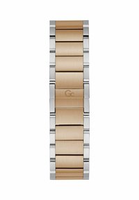 Dvi spalvų metalinė laikrodžio juosta su šlifuotais auksiniais centriniuose ryšuliuose ir poliruotais sidabriniais kraštais, su „Gc“ logotipu ant centrinio sagties ryšulio.