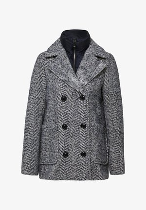 Double-breasted gray herringbone wool coat with wide lapels, black buttons, front pockets, and a zipped inner black quilted layer.