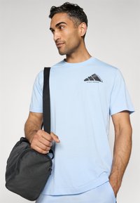 adidas Performance Sports T-shirts - glow blue