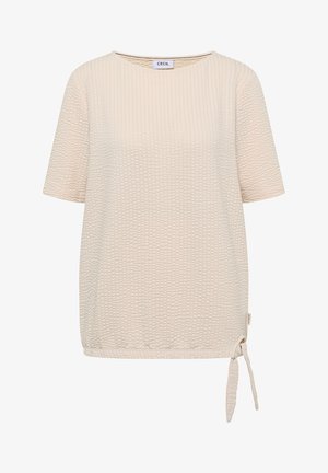 Beige kurzärmelige, strukturierte Bluse mit rundem Ausschnitt und gebundenem Detail am unteren rechten Saum.