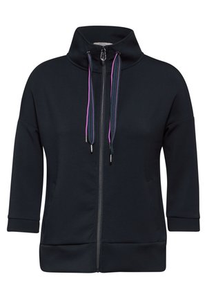 Sweatshirt zippé bleu marine avec un col haut, des manches courtes et des accents de cordon de couleur. Doté d'un tissu lisse et de poches latérales.