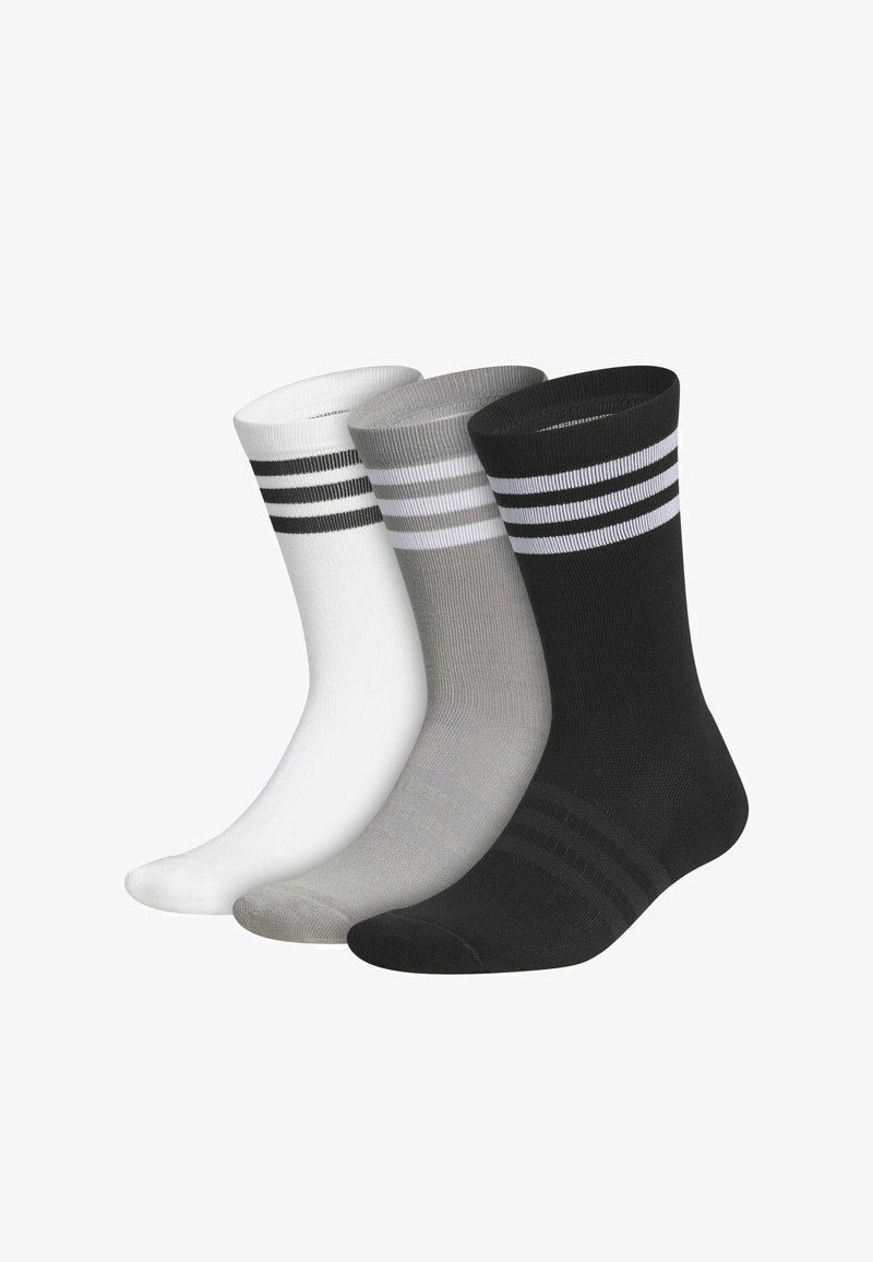 Trois paires de chaussettes montantes en blanc, gris et noir, chacune avec trois bandes horizontales près du bord.