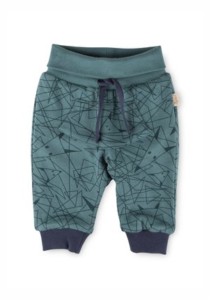 Pantaloni jogger in cotone color verde petrolio con motivo geometrico, vita elastica, cordoncino e polsini a coste blu navy. Presenta una tasca frontale.