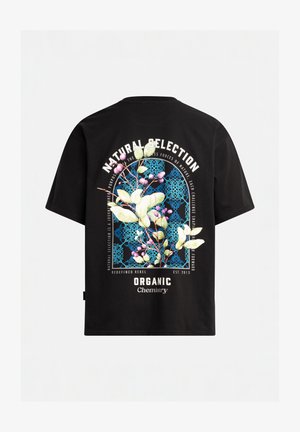 Black cotton t-shirt featuring a colorful floral graphic on the back with text, outlined by a blue geometric design and brand logo below.