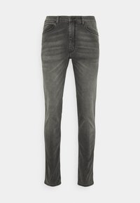 Jeans in denim scuro dal taglio slim-fit con un aspetto sbiadito, cinque tasche, cuciture in contrasto e zip.