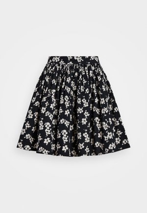 Černá květinová sukně z bavlny s nařaseným designem a bílými květinovými vzory. Elastický pas pro pohodlí a dobré držení.