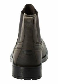 Braune Leder-Ankle Boots mit glatter Oberfläche, elastischen seitlichen Einsätzen und runder Zehenpartie. Eleganter, niedriger Blockabsatz und dezente Nähdetails.