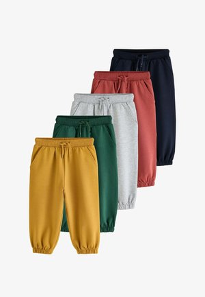 Fem par børnesweatpants i sennepsgul, grøn, lysegrå, rust og marineblå, stablet med snore og elastiske manchetter.