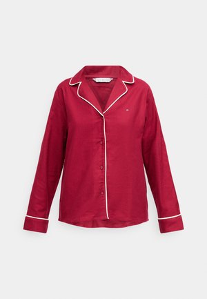 Rode lange mouwen shirt met witte piping op de kraag en manchet, met een knoopsluiting aan de voorkant en een relaxte pasvorm. Gemaakt van een katoenmix.