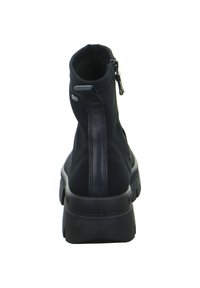 Bottine noire avec un dessus en cuir lisse et textile, dotée d'une fermeture éclair sur le côté, d'une semelle rembourrée et d'un talon texturé.