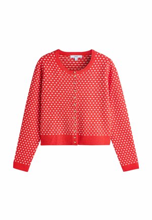 Red cropped cardigan with white polka dots, round neck, long sleeves, and gold heart-shaped buttons down the front.