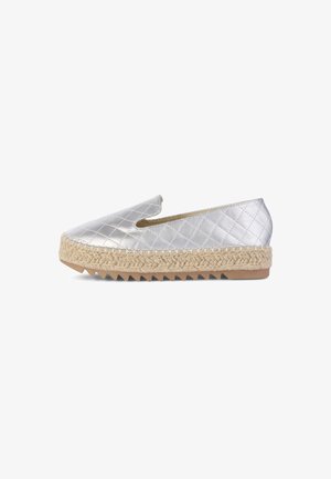 Silver quilted slip-on espadrille with jute sole, round toe, and textured upper. Features a flat, serrated rubber outsole for grip.