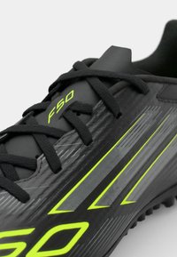 adidas Performance F50 CLUB TF - Fodboldstøvler til kunstgræs - core black/iron metallic/lucid lemon