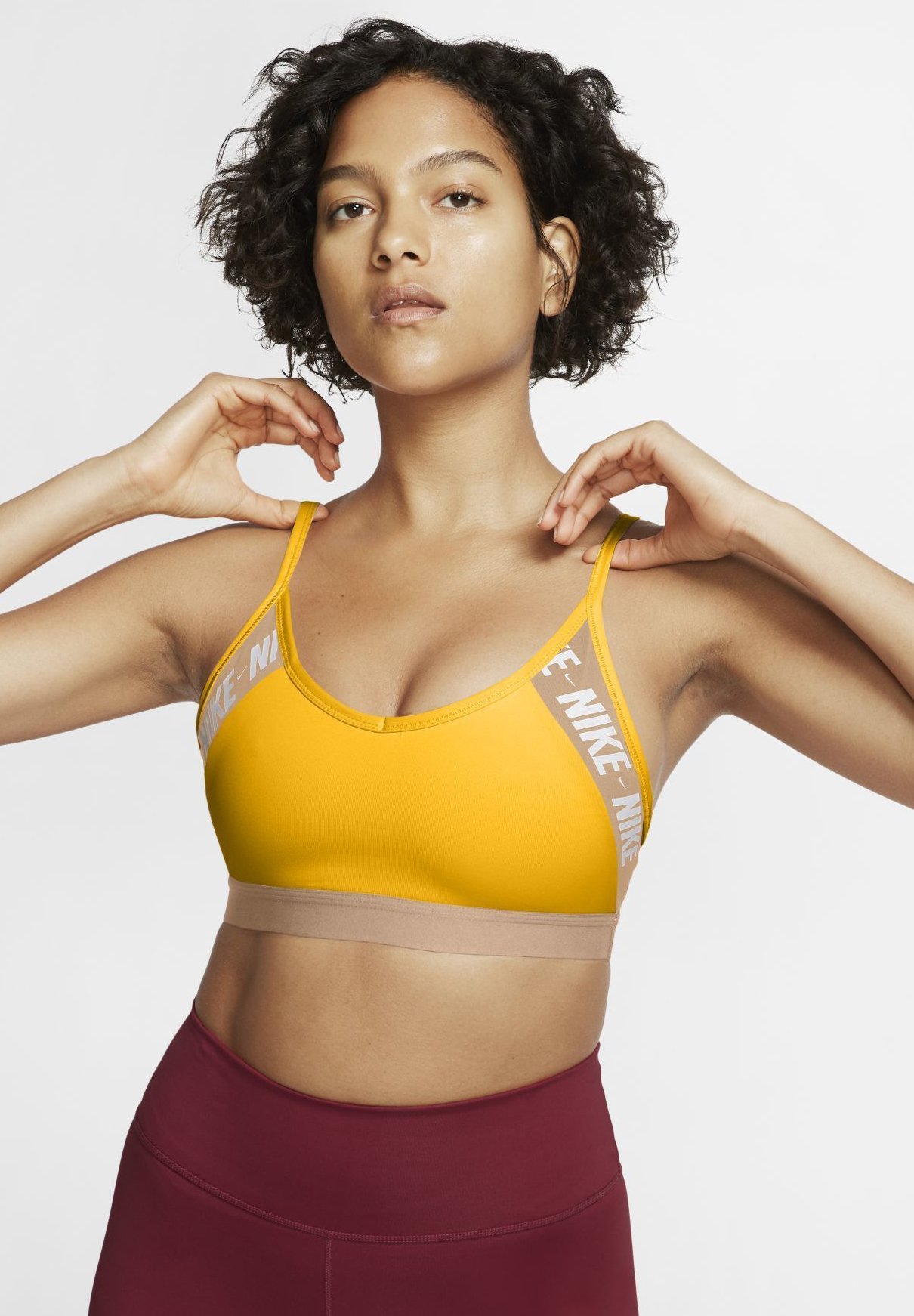 reggiseno nike giallo