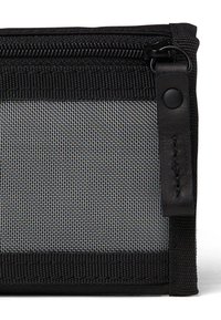 Black mesh zippered pouch with textured fabric, solid black edges, and a leather accent. Features a visible zipper and snap button detail.