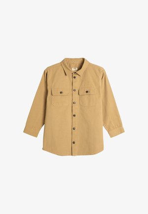 Beige overhemd met lange mouwen van katoen, met een kraag, voorzien van twee borstzakken en donkere knopen aan de voorkant. Glad textuur, ontspannen pasvorm.