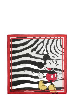 Mickey Mouse idzie po czarno-białym tle w paski zebry z czerwoną obwódką wokół krawędzi.