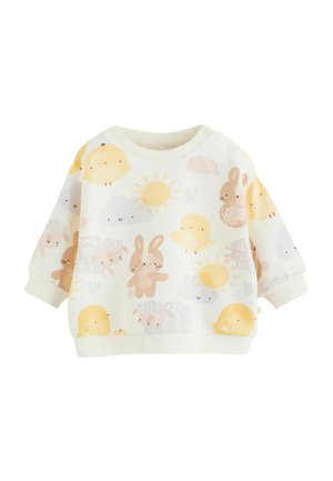 Bomuldspullover med et farveskema i lysegult og hvidt. Indeholder illustrationer af dyr og natur, herunder en sol og skyer.