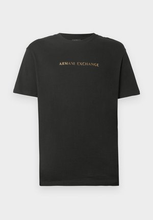 Black short-sleeve crew neck t-shirt with "ARMANI EXCHANGE" printed in gold lettering across the chest.