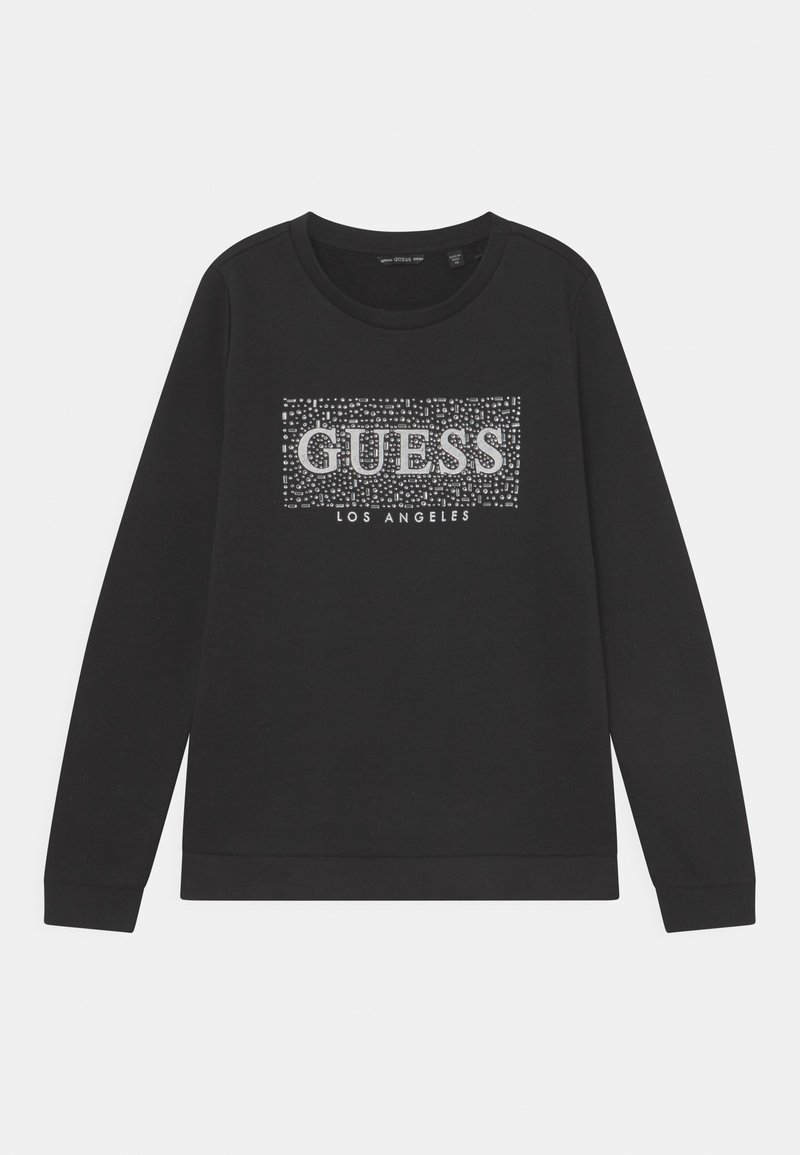 Černá mikina s dlouhým rukávem, která má stříbrný třpytivý logo "GUESS" s nápisem "LOS ANGELES" pod ním, kulatý výstřih a žebrované manžety.