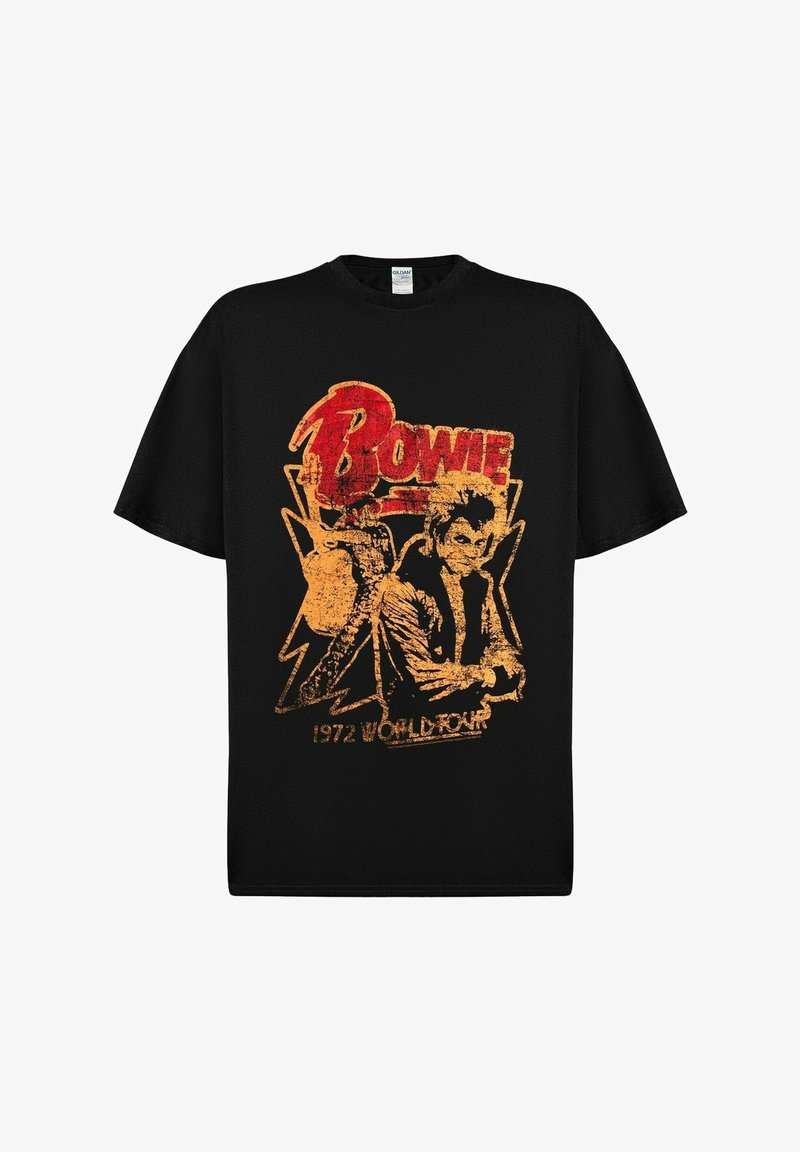 Černé tričko s opotřebovaným grafickým potiskem v červené a zlaté barvě, zobrazující postavu a text "BOWIE 1972 WORLD TOUR."