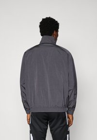 adidas Originals MANCHESTER UNITED ICON  - Športne kratke hlače - utility black