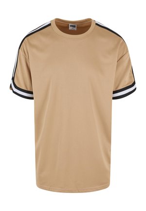 Transparente Mesh-T-Shirt mit kurzen Ärmeln. Schwarz-weiße Streifen an den Schulternähten. Rundhalsausschnitt und lockere Passform. Weiche Textur.
