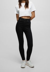 PULL&BEAR Vaqueros pitillo - black