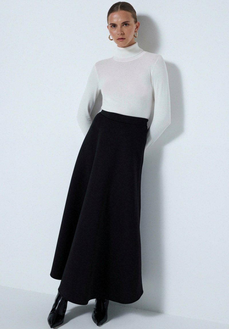 Touché Privé Maxirok zwart Touché Privé Maxirok zwart