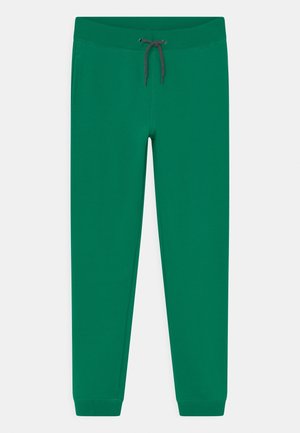 Grønne atletiske joggers med elastisk talje, grå snor, sidelommer og ribbet manchet ved anklerne, vist på hvid baggrund.