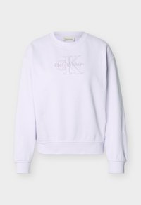 Λευκή μακρυμάνικη μπλούζα Calvin Klein με στρογγυλή λαιμόκοψη και ανάγλυφο λογότυπο "cK Calvin Klein" μπροστά.