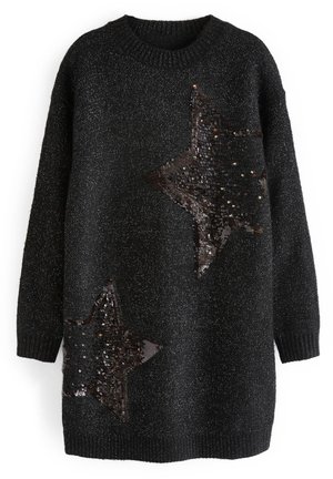 Pull en tricot à manches longues noir avec fil métallique et deux grandes étoiles en sequins noirs, l'une près de la poitrine et l'autre près de l'ourlet.